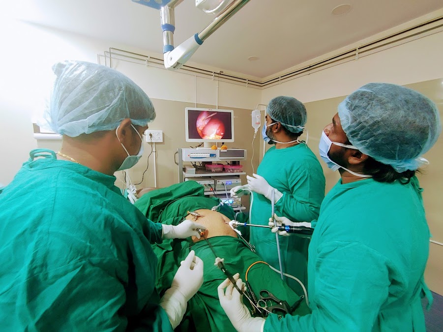Surgeons performing a laparoscopic procedure at Sri Janatha Hospital